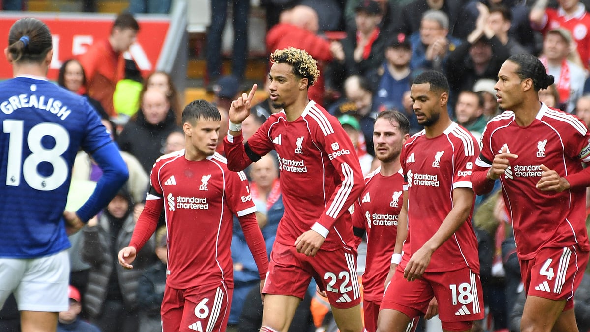 (AP Photo/Rui Vieira) : Liverpool's Hugo Ekitike, centre, celebrates after scoring his side's second goal during the English Premier League soccer match between Liverpool and Everton at Anfield stadium in Liverpool, England, Saturday, Sept. 20, 2025.