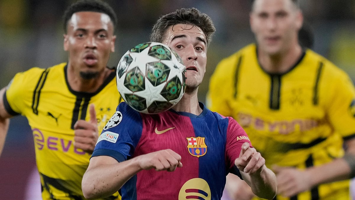 | Photo: AP/Martin Meissner : Barcelona's Gavi heads the ball during the Champions League quarterfinals second leg soccer match between Borussia Dortmund and Barcelona, at the Signa-Iduna Park in Dortmund, Germany, April 15, 2025. 