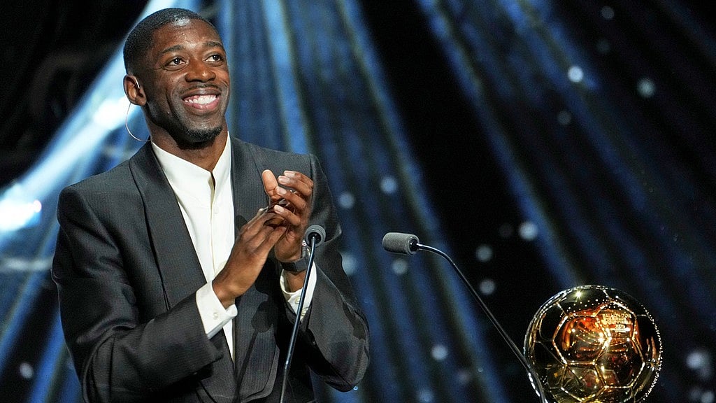 Photo: AP : Paris Saint-Germain's Ousmane Dembele receives the 2025 Men's Ballon d'Or during the awards ceremony at the Theatre du Chatelet in Paris.