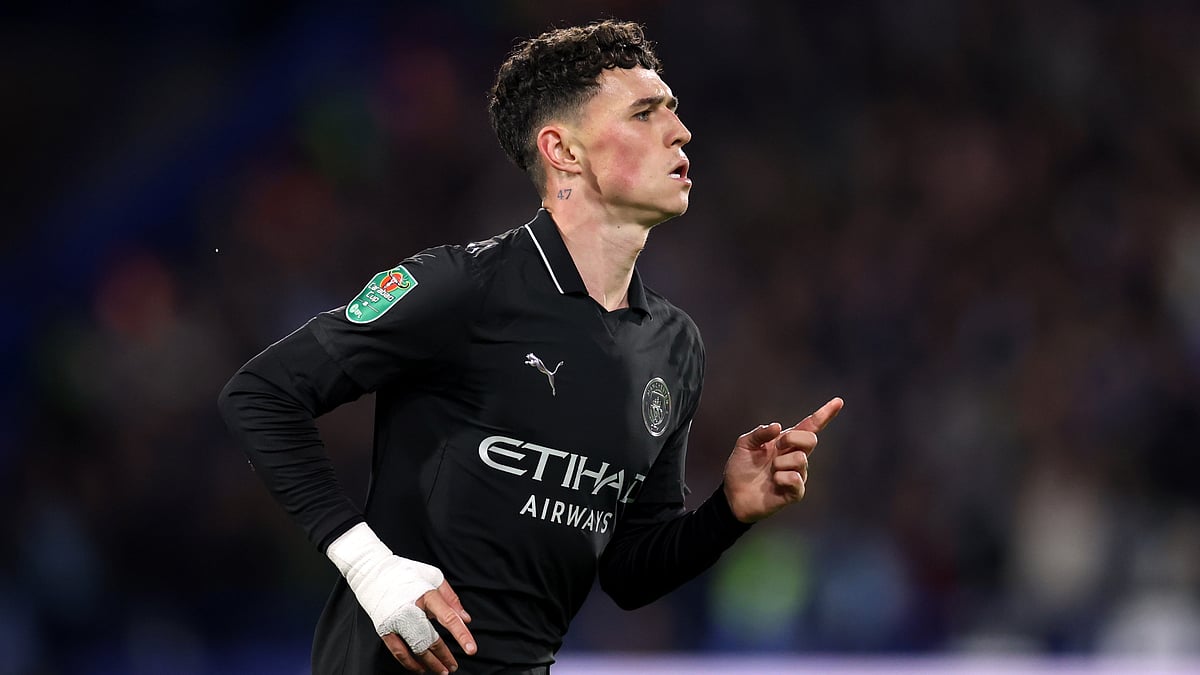 Phil Foden celebrates after scoring Manchester City's first goal against Huddersfield Town.