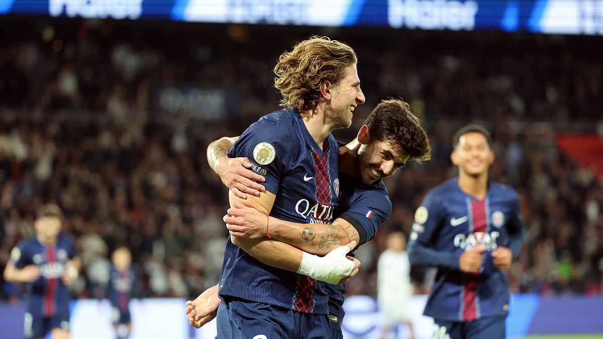 PSG defenders Illia Zabarnyi and Lucas Beraldo celebrate against Auxerre.