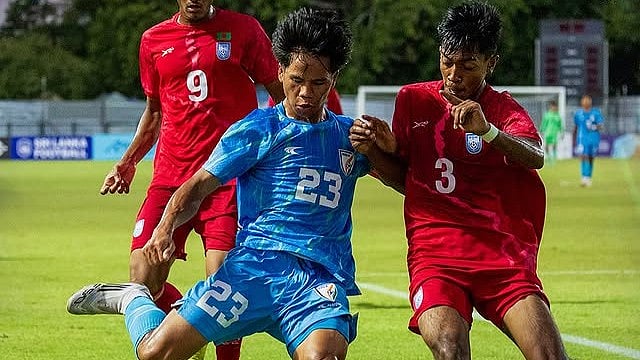 | Photo: Instagram/indianfootball : India vs Bangladesh, SAFF U17 Championship 2025 Final: Denny Singh Wangkhem competes for the ball against Ihsan Habib Riduan at the Racecourse International Stadium in Colombo on September 27, 2025.