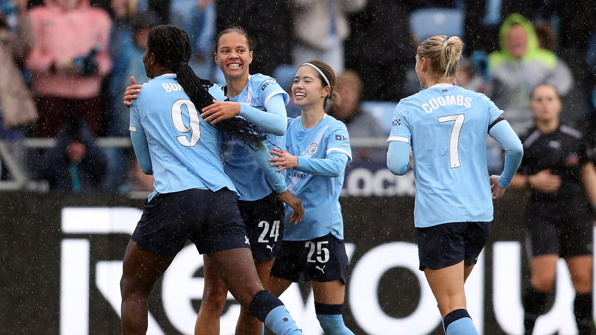 Iman Beney celebrates her goal for Manchester City Women against Arsenal Women.