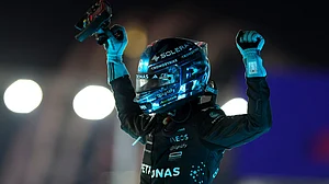 George Russell celebrates his win