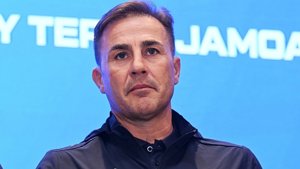 AP : Fabio Cannavaro, new coach of the Uzbekistan national football team, at a news conference ahead of the team's first FIFA World Cup, in Tashkent.