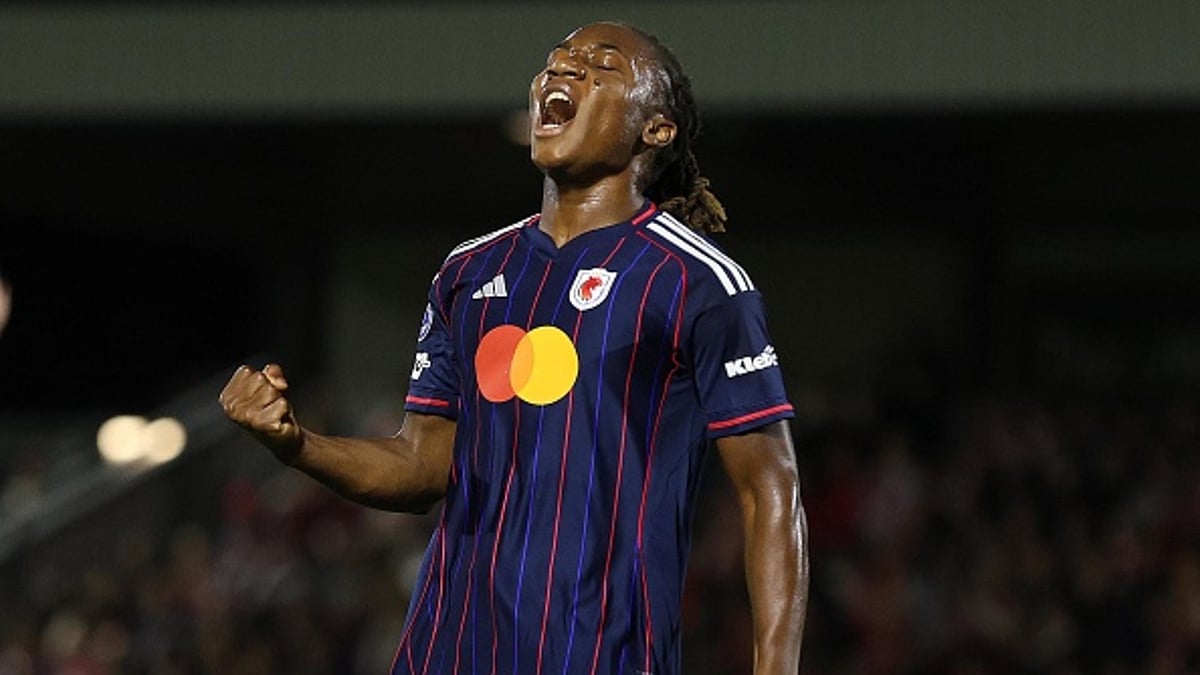 Melchie Dumornay celebrates goal in Lyon's win over Arsenal.