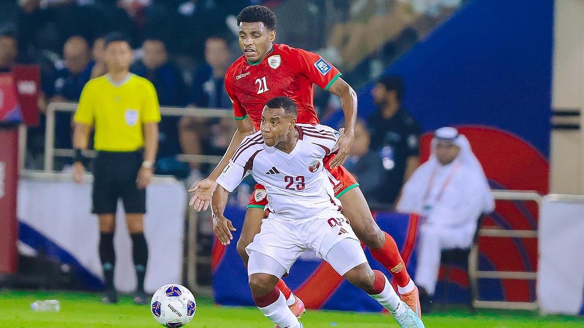 | Photo: Instagram/omanfa : Oman's Dahman fights for the ball with Qatar's Assim Omar Madibo during the FIFA World Cup 2026 AFC Qualifiers match on October 8, 2025.