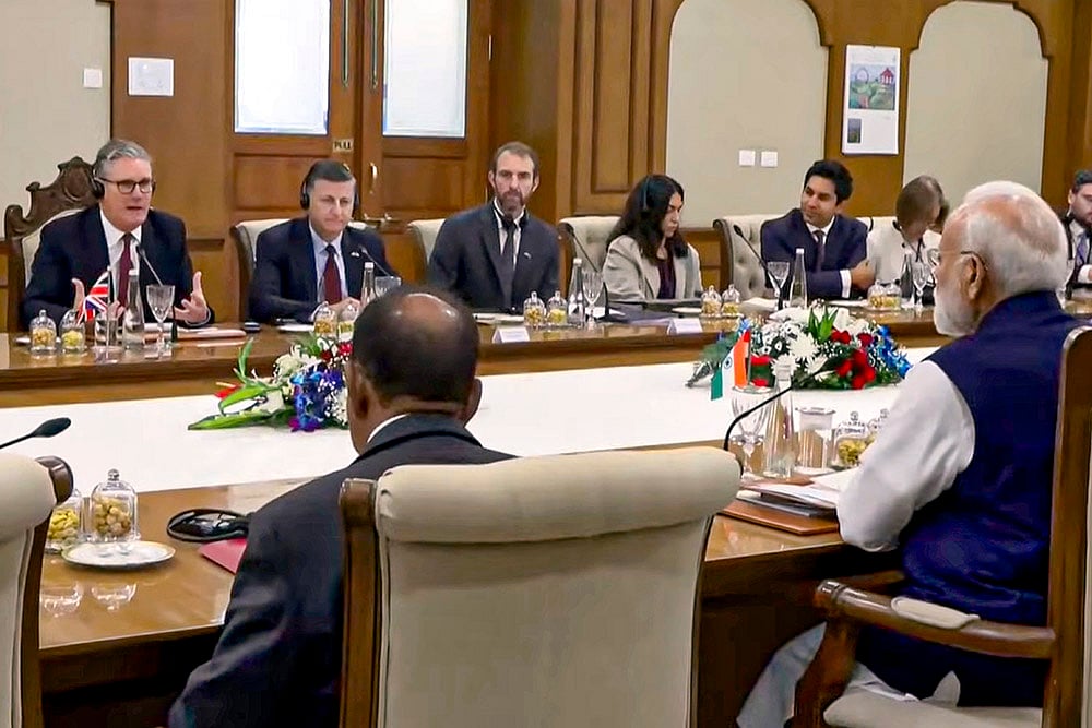 | Photo: @NarendraModi via PTI  : PM Modi with UK PM Keir Starmer