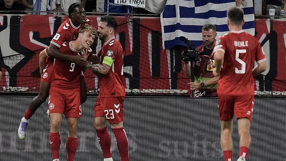 | Photo: AP/Thanassis Stavrakis : FIFA World Cup 2026 European Qualifiers: Denmark players celebrate a goal.