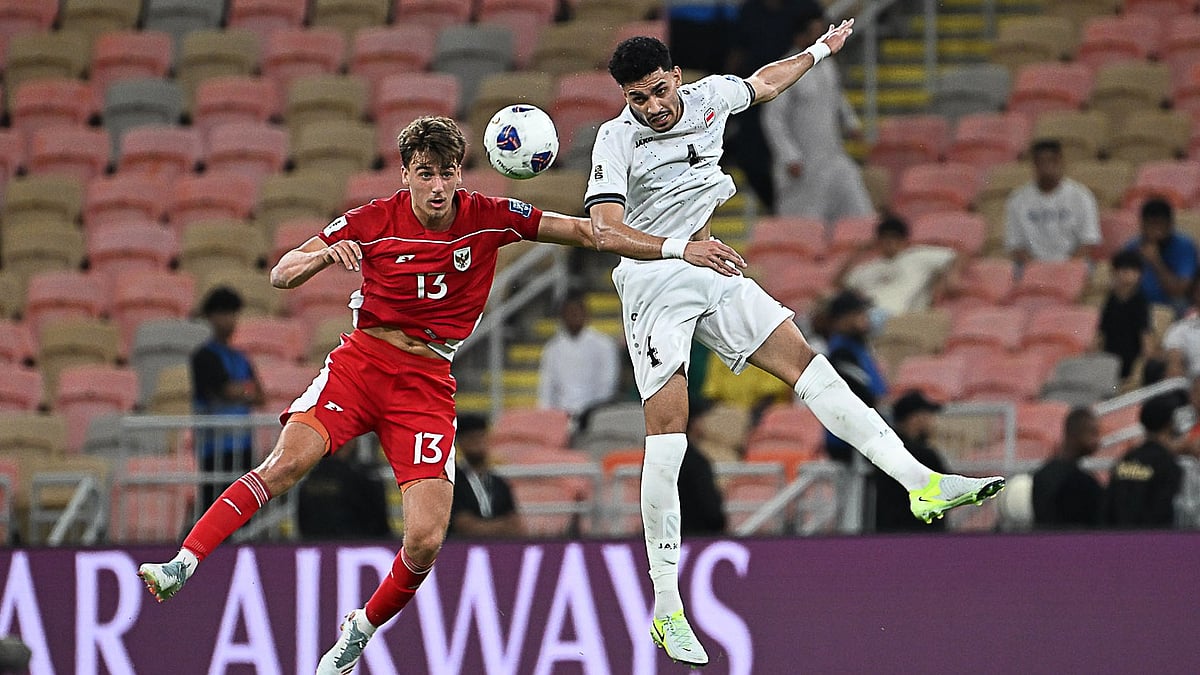 | Photo: AP/Ali Issa : Iraq's Zaid Tahseen, right, is challenged by Indonesia's Mauro Zijlstra during the World Cup 2026 Asian qualifier fourth-round Group B soccer match between Iraq and Indonesia at Alinma Bank Stadium in King Abdullah Sports City, in Jeddah, Saudi Arabia, Saturday, Oct. 11, 2025.