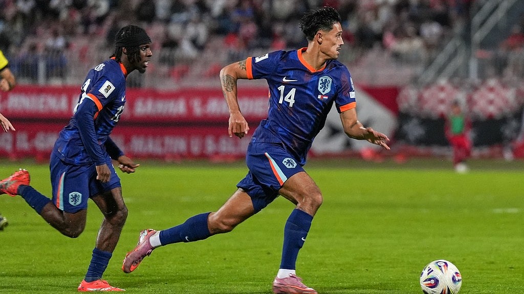 AP : Tijjani Reijnders of the Netherlands, right, runs with the ball during a World Cup 2026 group G qualifying match against Malta in Ta' Qali, Malta.