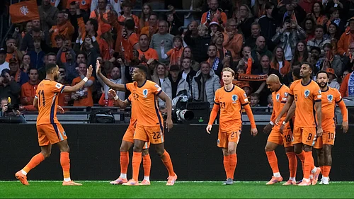 | Photo: AP/Patrick Post : The Netherlands players celebrate after Donyell Malen, 3rd right, scored the opening goal during a World Cup 2026 group G qualifying soccer match between the Netherlands and Finland in Amsterdam, Sunday, Oct. 12, 2025.