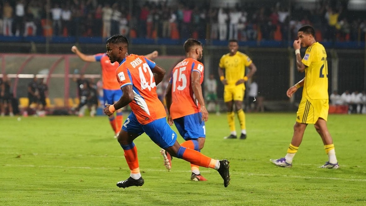 X/FC Goa : Brison Fernandes (left) celebrates after scoring for FC Goa against Al-Nassr in their AFC Champions League Two clash in Margao.