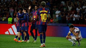 | Photo: AP/Joan Monfort : Barcelona's players celebrate the sixth goal of their team during the Champions League opening phase soccer match between Barcelona and Olympiacos in Barcelona, Spain, Tuesday, Oct. 21, 2025.