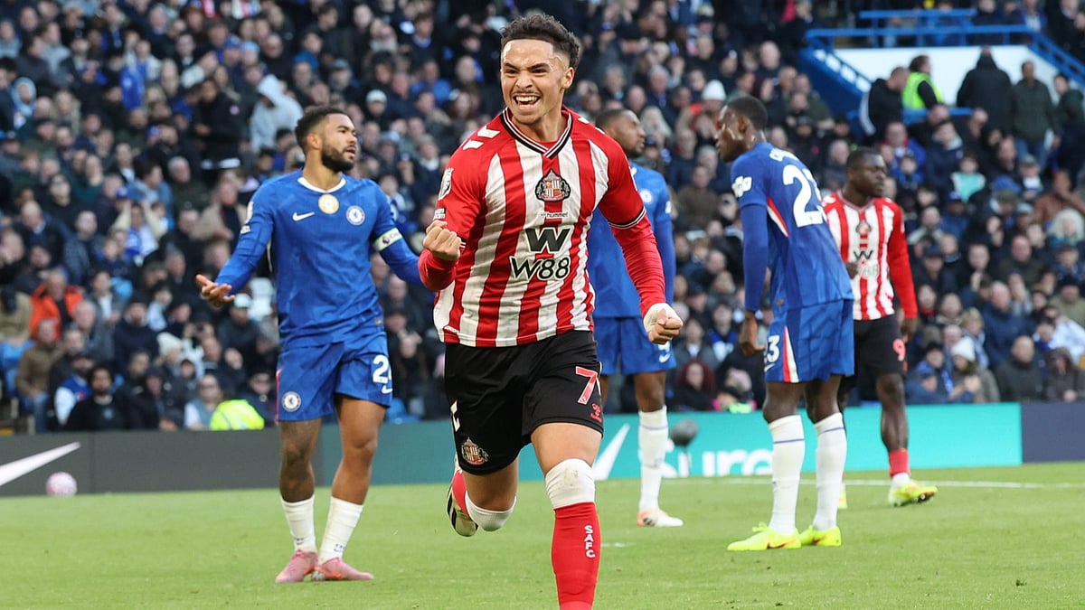 Talbi celebrates his late winner at Stamford Bridge
