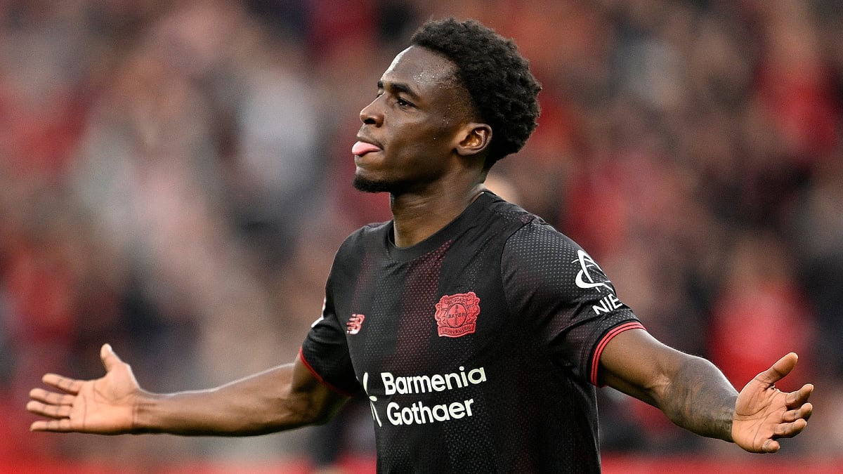 Ernest Poku celebrates his opener as Bayer Leverkusen defeat Freiburg 2-0.