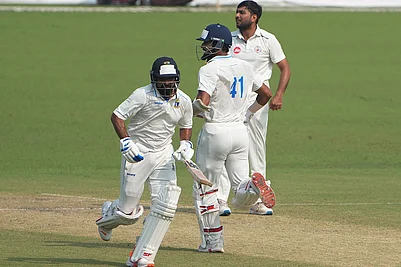 | Photo: PTI/Swapan Mahapatra : Bengals Akash Deep and Mohammed Shami sprint between the wickets during the second day of the Ranji Trophy cricket match between Bengal and Gujarat, at Eden Gardens, in Kolkata, West Bengal.