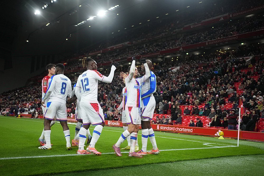 | Photo: AP/Jon Super : Liverpool vs Crystal Palace: Crystal Palace players celebrate after a goal during the English League Cup fourth round soccer match between Liverpool and Crystal Palace in Liverpool, England.
