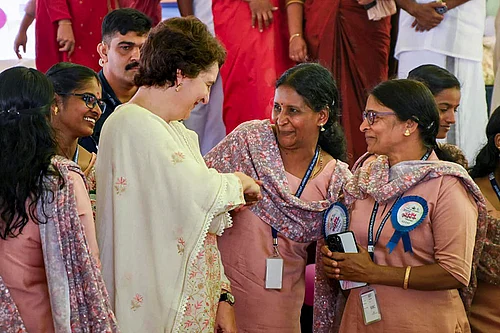 | Photo: AICC via PTI : Priyanka Gandhi Vadra in Wayanad: Congress MP Priyanka Gandhi Vadra during the inauguration of the Kudumbasree annual celebration at Mini Stadium, Padinjarathara, in Wayanad, Kerala.