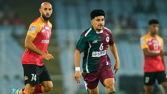 | Photo: Instagram/mohunbagansg : Mohun Bagan's Anirudh Thapa and East Bengal's Mohammed Rashid in action during the IFA Shield 2025 match on October 18, 2025.