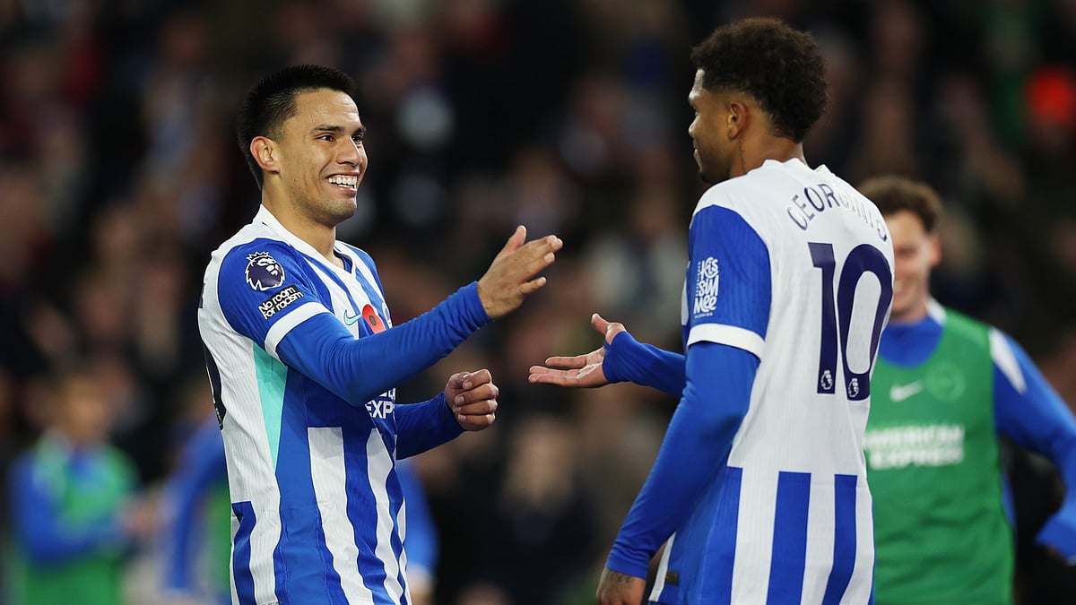 Diego Gomez and Georgino Rutter celebrate Brighton's third goal against Leeds United in English Premier League 2025-26.
