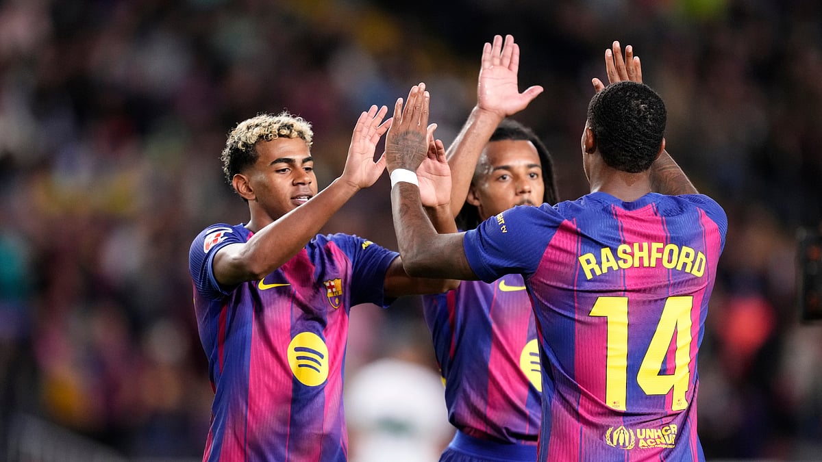 Barcelona celebrate their goal against Elche