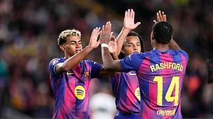 Barcelona celebrate their goal against Elche