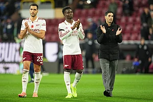 | Photo: AP/Jon Super : English Premier League 2025-26
Arsenal's manager Mikel Arteta, right, leaves the field with Arsenal's Bukayo Saka, centre, and Arsenal's Mikel Merino at the end of the English Premier League soccer match between Burnley and Arsenal in Burnley, England.