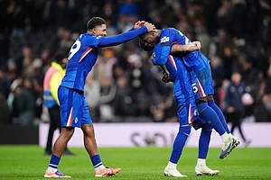 | Photo: John Walton/PA via AP : Chelsea's Moises Caicedo, right, Wesley Fofana, left, and Malo Gusto celebrate after the English Premier League soccer match between Tottenham Hotspur and Chelsea in London.