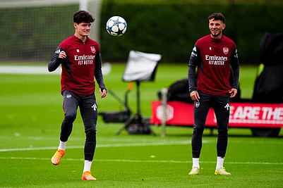 | Photo: Bradley Collyer/PA via AP : Arsenals Christian Norgaard, left, during a training session in London, England, ahead of the Champions League soccer match against Slavia Praha.