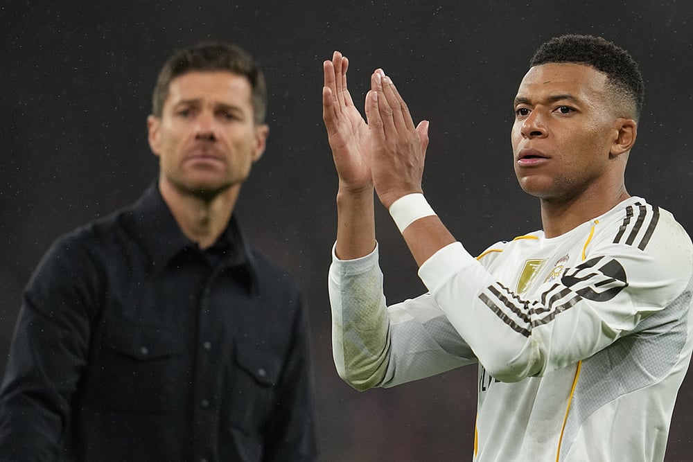 | Photo: AP/Jon Super : Real Madrid's head coach Xabi Alonso and Kylian Mbappe walk off the oitch after the Champions League soccer match between Liverpool and Real Madrid in Liverpool, England.