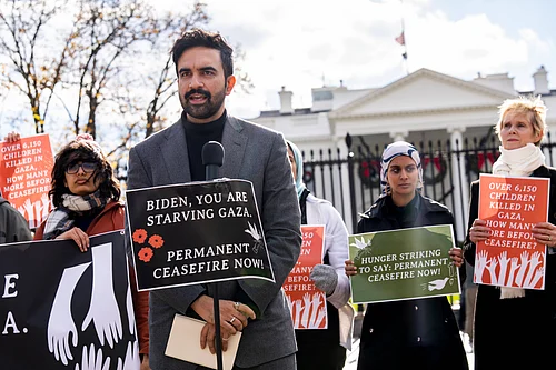 IMAGO/Newscom World : Ceasefire Hunger Strike UNITED STATES - NOVEMBER 27: New York State Rep. Zohran Mamdani (D), speaks during a news conference outside the White House to announce a hunger strike to demand that President Joe Biden call for a permanent ceasefire and no military aid to Israel, on Monday, November 27, 2023.