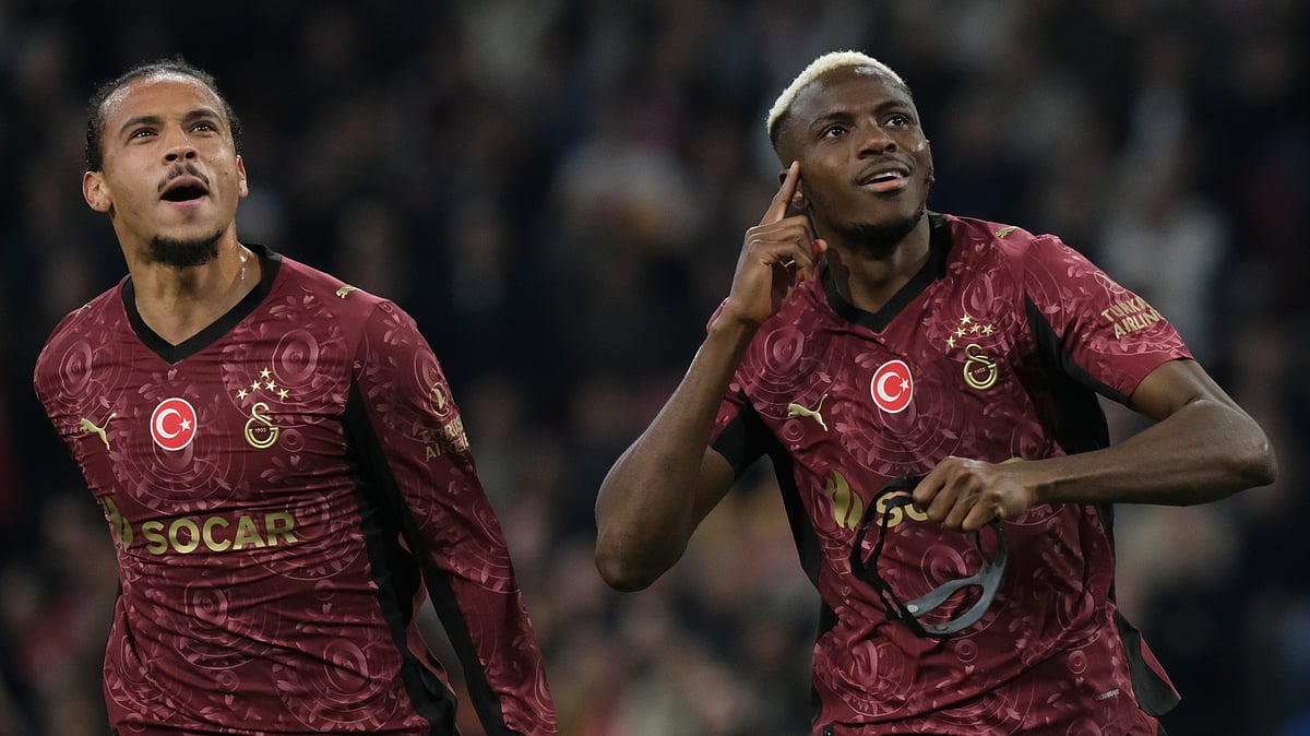 (AP Photo/Patrick Post) : Galatasaray's Leroy Sane, left, and Victor Osimhen celebrate after a goal during the Champions League between Ajax and Galatasaray in Amsterdam, Netherlands, Wednesday, Nov. 5, 2025.