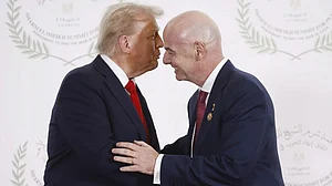 | Photo: Pool photo/Yoan Valat via AP : President Trump and FIFA President Gianni Infantino pose during the greetings ceremony before the family picture at the Gaza Peace Summit in Sharm el-Sheikh, Egypt, Monday, Oct.13 2025.