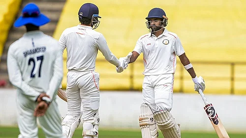 Photo: PTI : Vidarbhas Ravikumar Samarth being congratulated on his half century on the fourth and last day of the Ranji Trophy 2025-26 cricket match between Vidarbha and Jharkhand, in Nagpur, Maharashtra