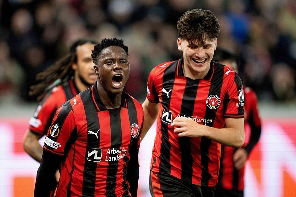 | Photo: Bo Amstrup/Ritzau Scanpix via AP : Midtjylland's Franculino Dju, left, together with Mikel Gogorza celebrate scoring their side's third goal of the game during the Europa League soccer match between FC Midtjylland and Celtic FC in Herning, Denmark.