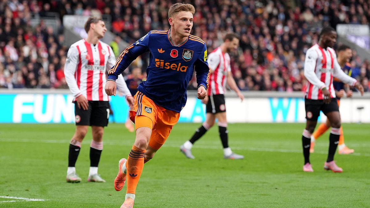 | Photo: PA/Adam Davy via AP : Newcastle United's Harvey Barnes celebrates after scoring the opening goal during the English Premier League match against Brentford on Sunday, November 9, 2025. 
