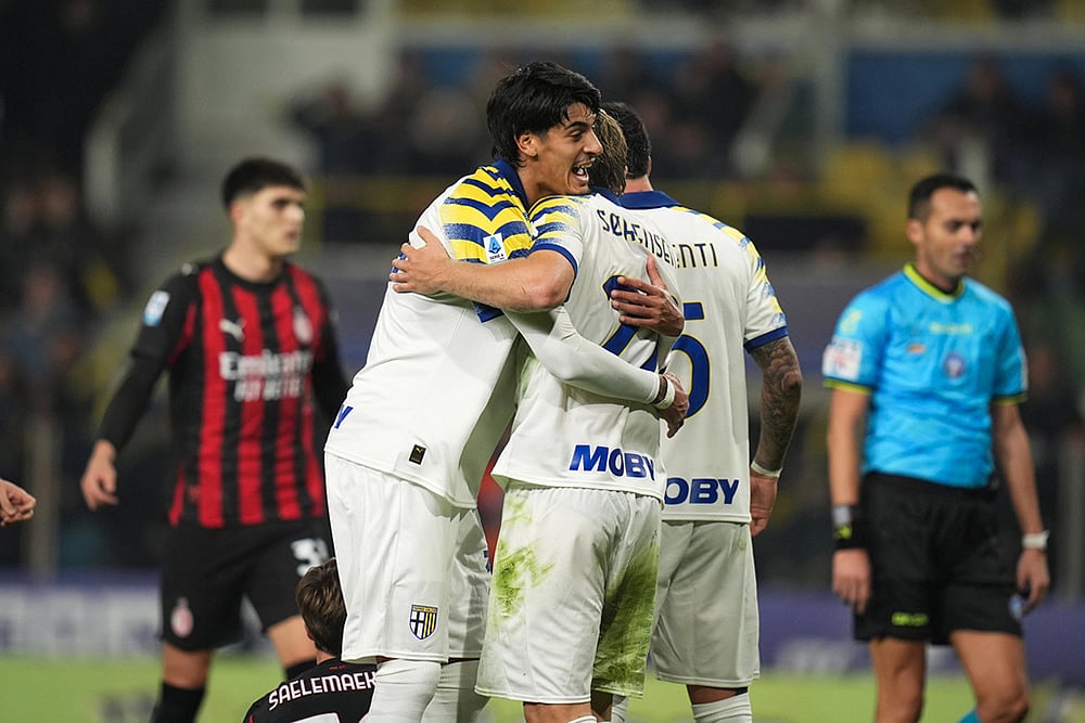 | Photo: Massimo Paolone/LaPresse via AP : Parma's Mariano Troilo and Parma's Oliver Sorensen Jensen celebrate during the Serie A soccer match against Milan in Parma, Italy.
