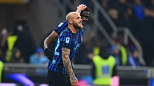 Inter Milan's Federico Dimarco celebrates with Ange-Yoan Bonny after his side's second goal against Lazio in Serie A on November 9, 2025.