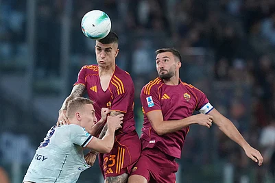 | Photo: Alfredo Falcone/LaPresse via AP : Romas Gianluca Mancini heads the ball during the Serie A soccer match between Roma and Udinese, in Rome.