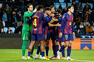 | Photo: AP/Lalo R. Villar : Barcelona players celebrate at the end of the Spanish La Liga soccer match between Celta Vigo and Barcelona in Vigo, Spain.