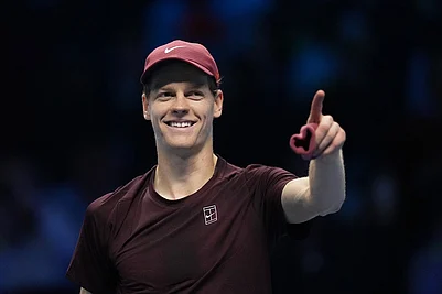 | Photo: AP/Antonio Calanni : Italys Jannik Sinner celebrates after winning against Canadas Felix Auger-Aliassime during their tennis match of the ATP World Tour Finals, in Turin, Italy.