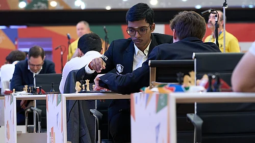 Eteri Kublashvili/FIDE : R Praggnanandhaa making his move against Daniil Dubov in round four, game two of FIDE Chess World Cup 2025 in Panaji.