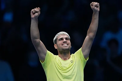 | Photo: AP/Antonio Calanni : Spains Carlos Alcaraz celebrates after winning against United States Taylor Fritz during their tennis match of the ATP World Tour Finals, in Turin, Italy.