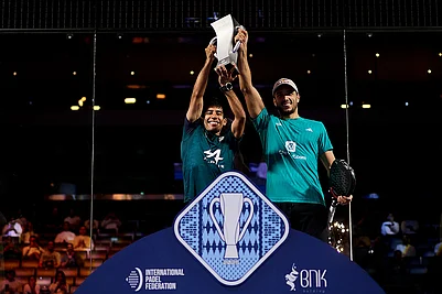 | Photo: Premier Padel / Red Bull Content Pool : Federico Chingotto and Alejandro Galan pose with their winner trophies during the trophy ceremony of the FIP World Cup in Pairs, Kuwait on November 9, 2025.