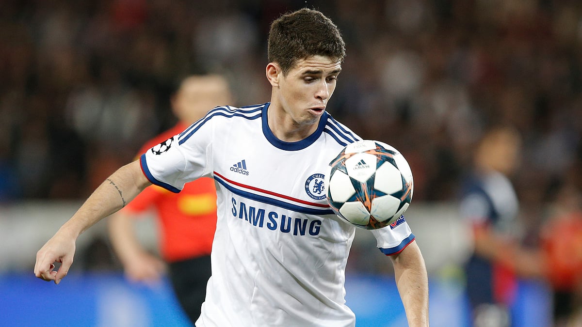 AP/File Photo : Chelsea's Oscar eyes the ball during the Champions League quarterfinal first leg soccer match between PSG and Chelsea, at the Parc des Princes stadium.