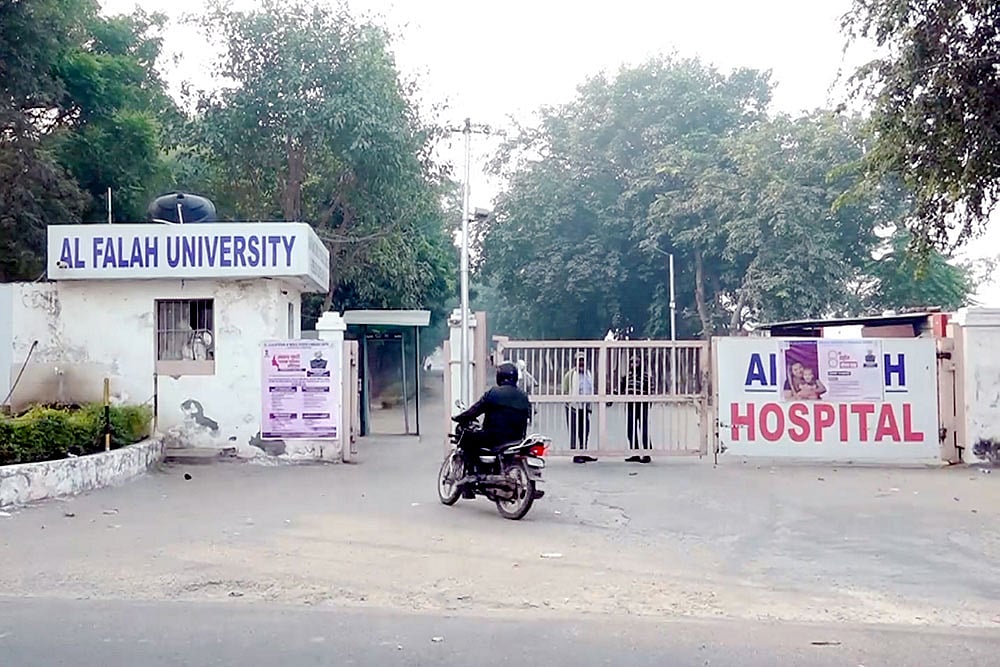 | Photo: PTI : A view of the Al-Falah University after 2,900 kg of explosives and inflammable material was recovered from two rented rooms of a Kashmiri doctor earlier this week, in Faridabad, Wednesday, Nov. 12, 2025. 