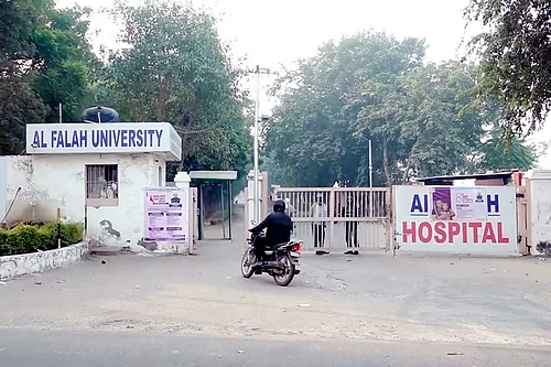 | Photo: PTI : A view of the Al-Falah University after 2,900 kg of explosives and inflammable material was recovered from two rented rooms of a Kashmiri doctor earlier this week, in Faridabad, Wednesday, Nov. 12, 2025.
