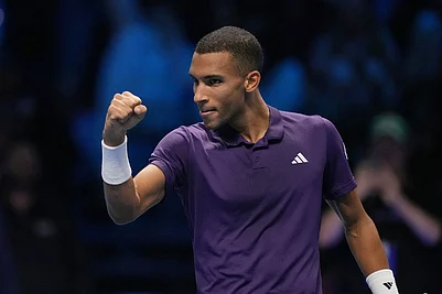 | Photo: AP/Antonio Calanni : Canadas Felix Auger-Aliassime celebrates after winning against United States Ben Shelton during their tennis match of the ATP World Tour Finals, in Turin, Italy.