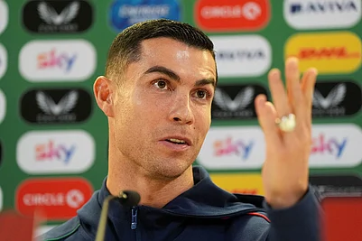 | Photo: Brian Lawless/PA via AP : Portugals Cristiano Ronaldo speaks during a press conference in Dublin, Ireland, ahead of Thursdays World Cup qualifying soccer match against Ireland.